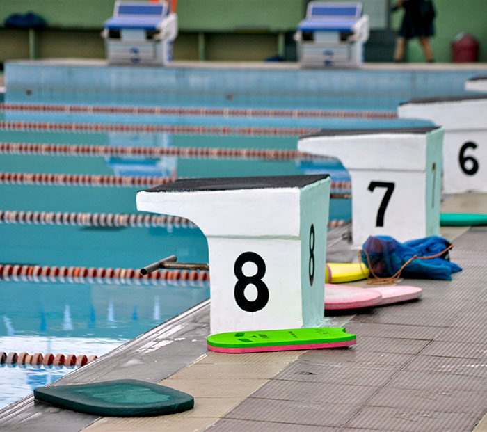 Breaking the Rules: Trans Woman Competes Topless in Men’s Race to Protest Controversial Policy - 2025 5 competition swimming pool 6852988e81cd1 700