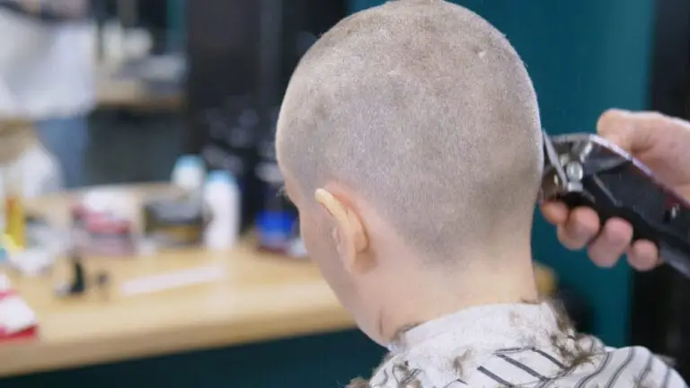 Dad shaves his daughters head after she is seen bullying a classmate who has cancer