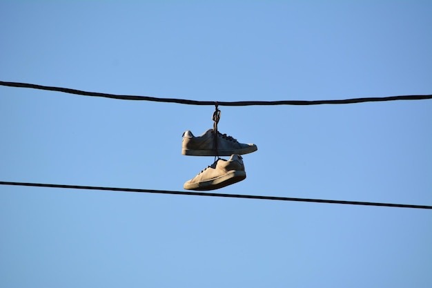 Why Are Shoes Hanging on Power Lines? Urban Myth, Message, or Mischief? Shocking 2025 4 Shoes Hanging on Power Lines?