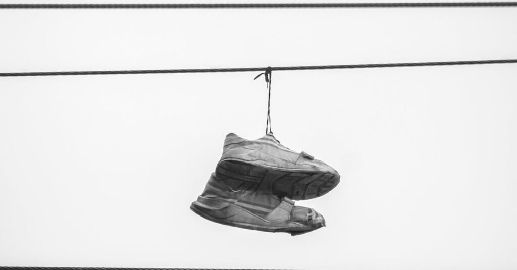 Why Are Shoes Hanging on Power Lines? Urban Myth, Message, or Mischief? Shocking 2025 3 pexels photo 31649127